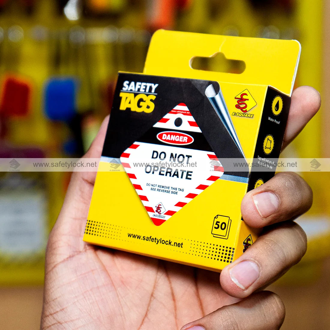 small and compact square safety tags in hand