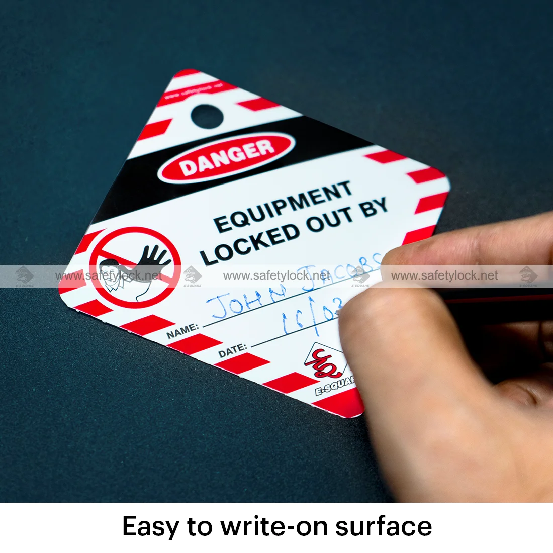small square lockout safety tags on a roll